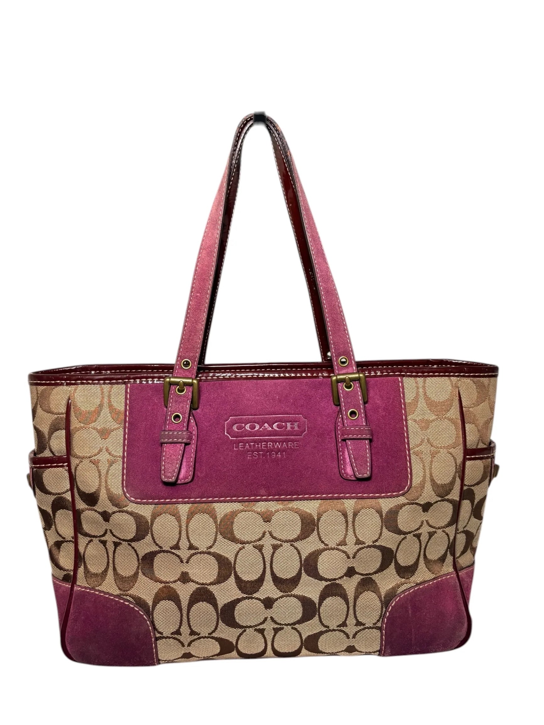 Loving Preloved Coach signature canvas tote bag in tan and brown with magenta suede accents and trim. Features exterior pockets and classic "C" pattern.